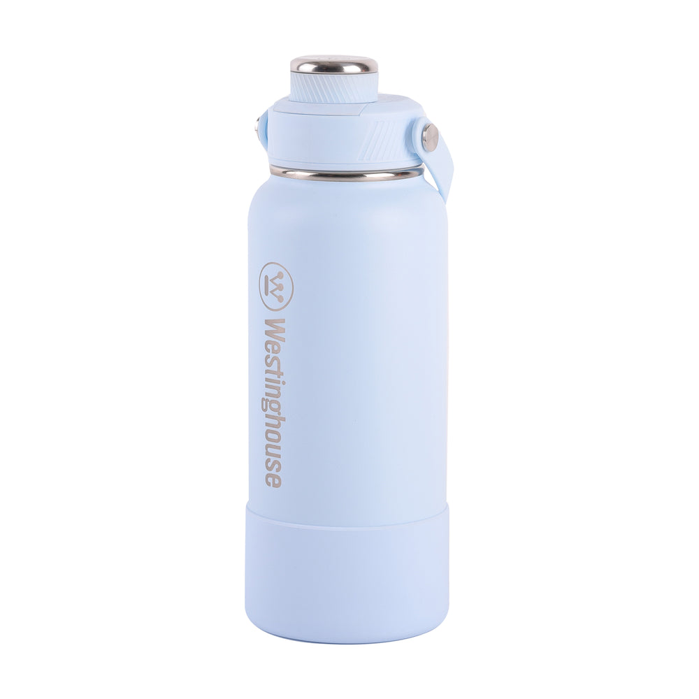 Botella térmica doble pared acero inoxidable 946 ml con boquilla y funda silicona celeste · Mantiene bebidas frías y calientes