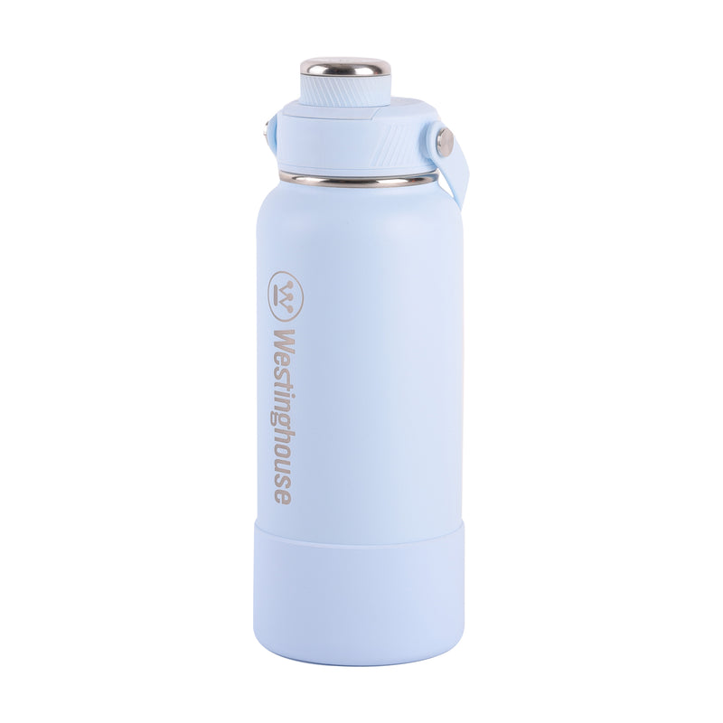 Botella térmica doble pared acero inoxidable 946 ml con boquilla y funda silicona celeste · Mantiene bebidas frías y calientes