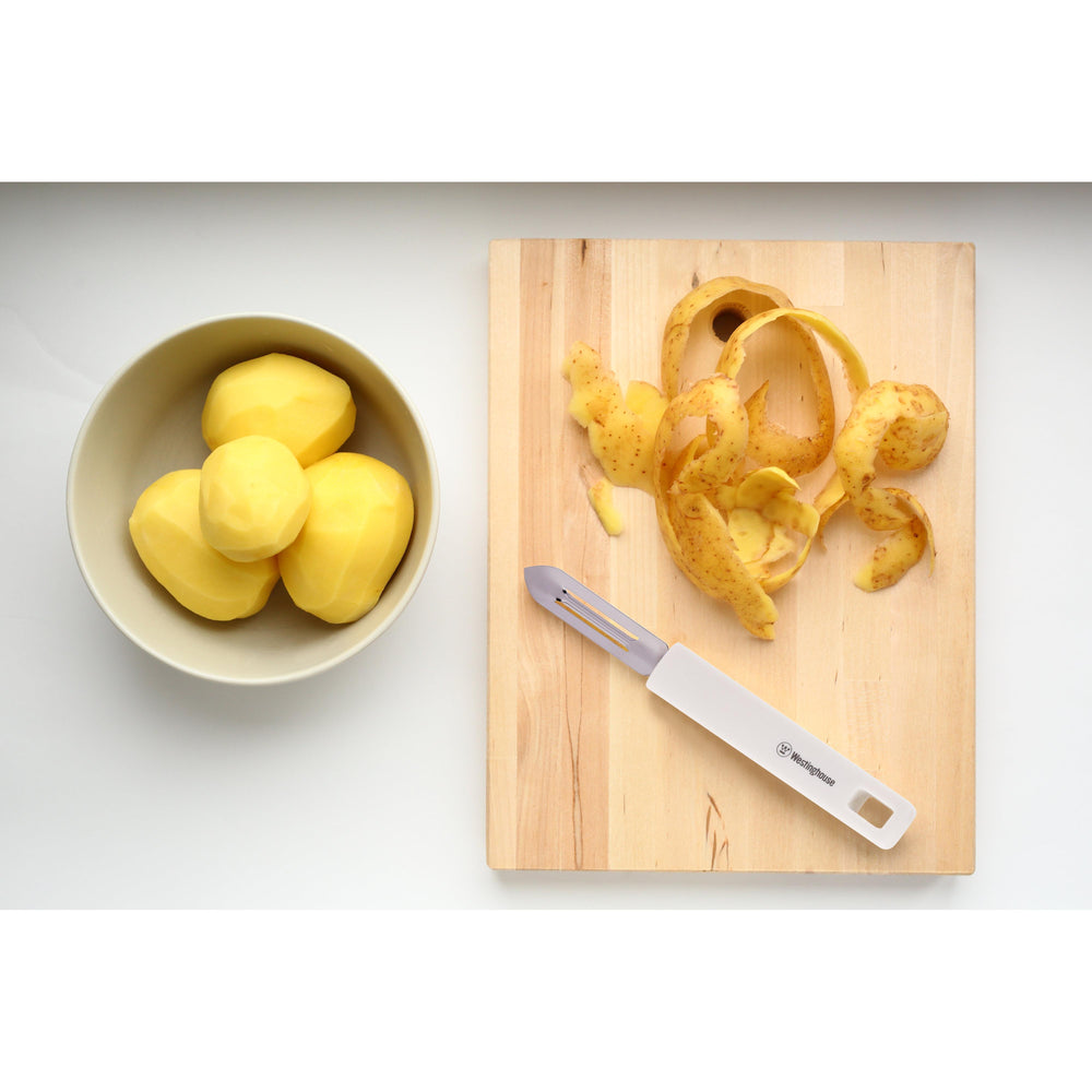 Pelador verduras acero inoxidable blanco - Mango Ergonómico y Corte Preciso